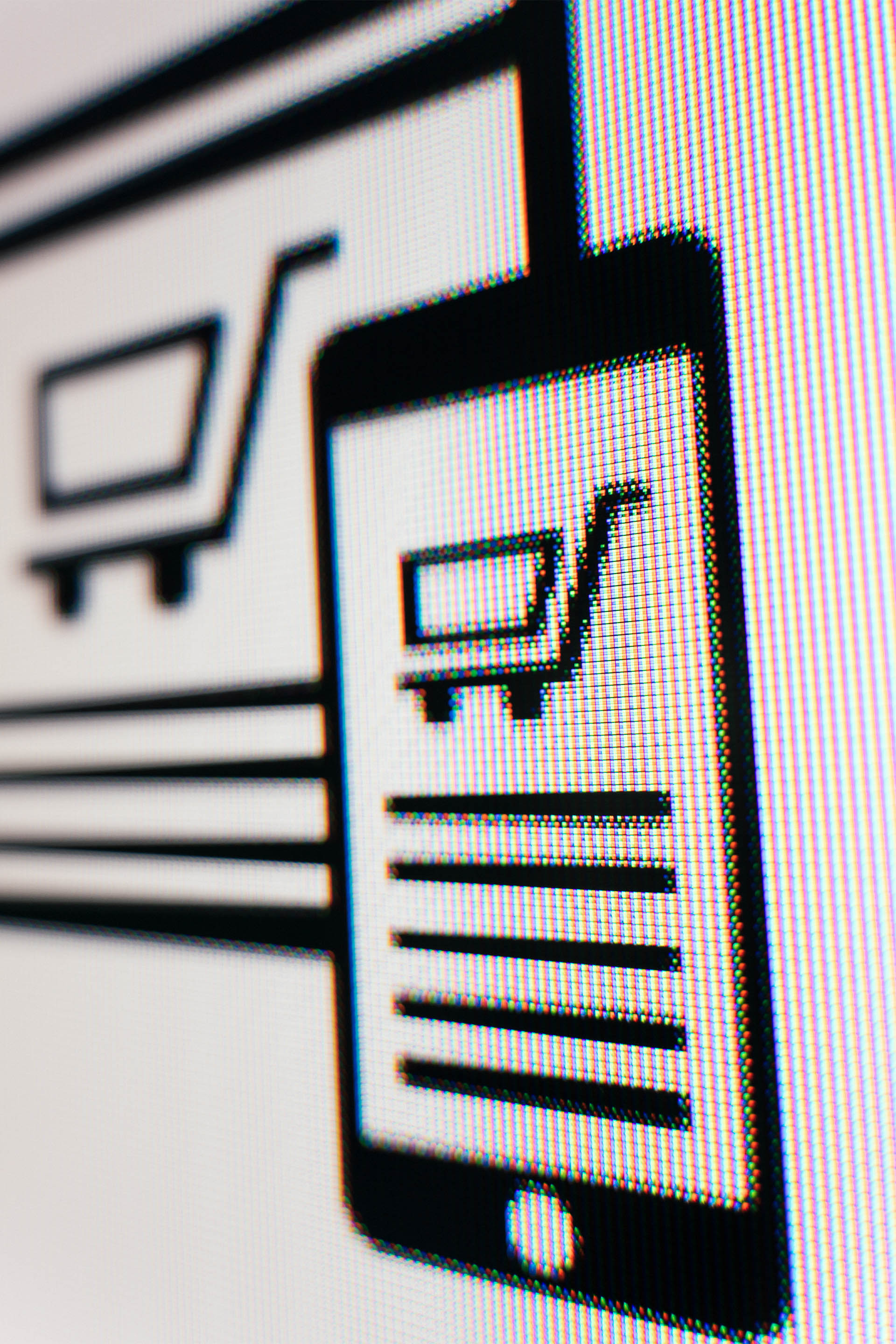 Close-up of a screen shows the illustration of a smartphone displaying a shopping cart with five lines.
